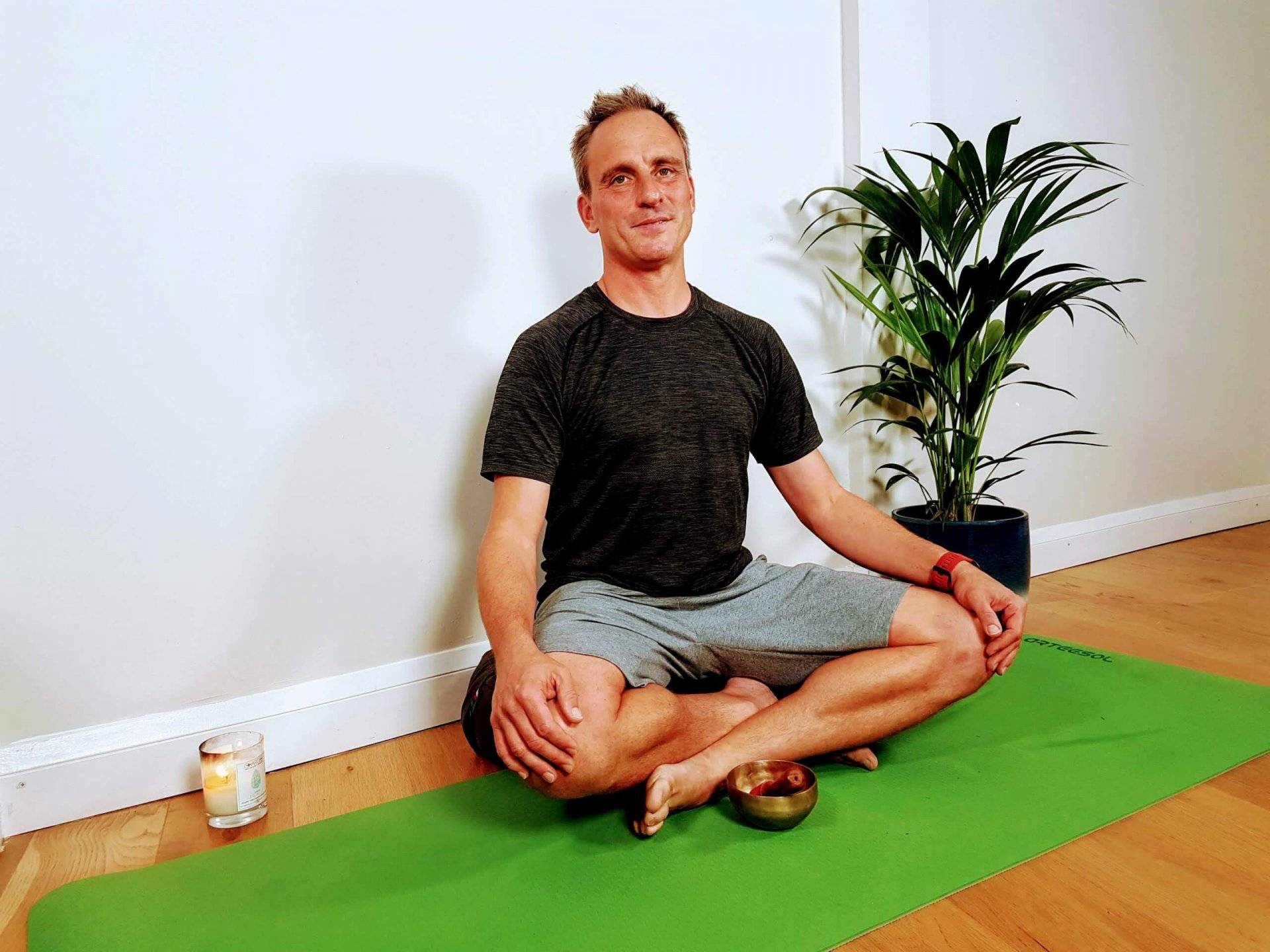 yoga teacher meditating